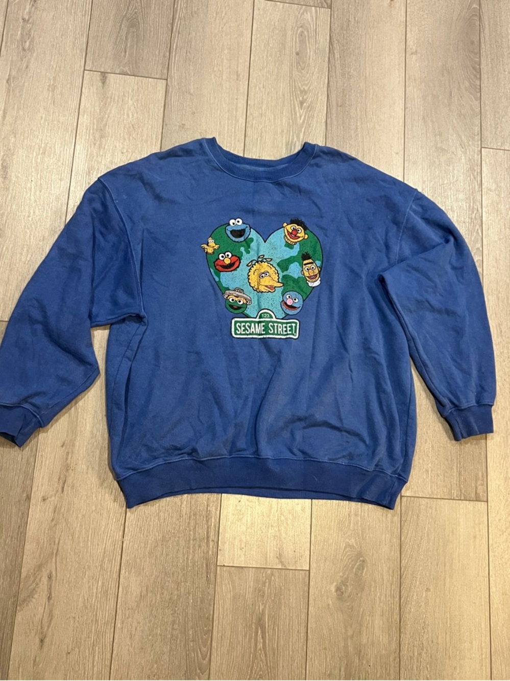 Sesame Street Royal Blue Crewneck Sweatshirt with Character Heart Patch